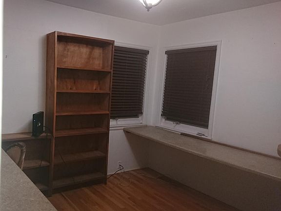 South West bedroom, ~100sqft, currently set up as home office