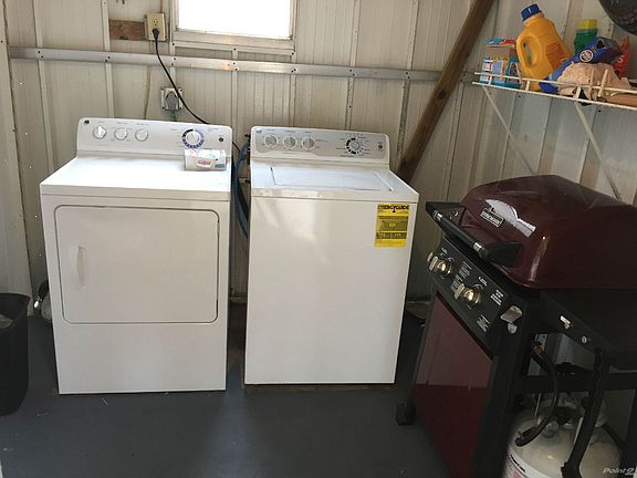 washer and dryer in shed