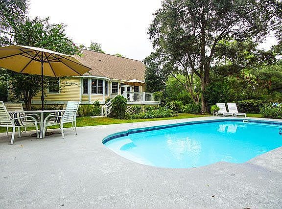 Swimming pool & rear of hous