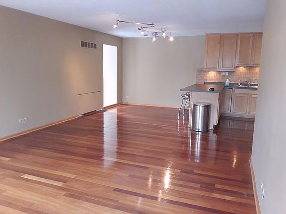 Living room looking onto dining area.