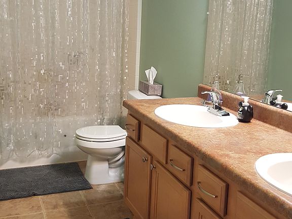 Full half bath w/ dual sinks