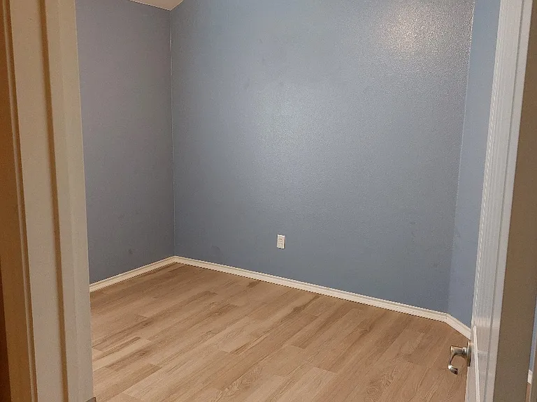 One of two secondary bedrooms.