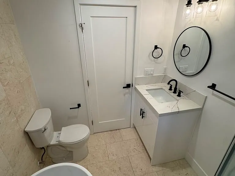 Bathroom 2 with shower and stand alone tub