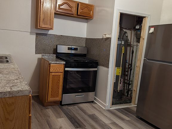 2nd image of 4925 S Justine St Unit 1