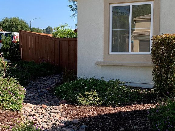 Drought tolerant front yard which is managed by a third party gardener that the landlord pays for.