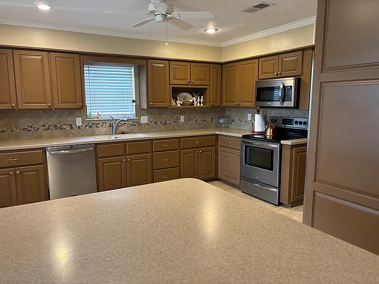 large kitchen with moderan appliances