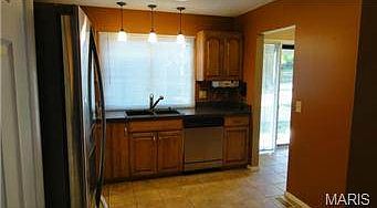 Updated Eat-In Kitchen, Stainless Appliances, Ceramic Tile F