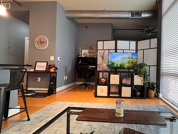 View from couch to TV and Office Corner