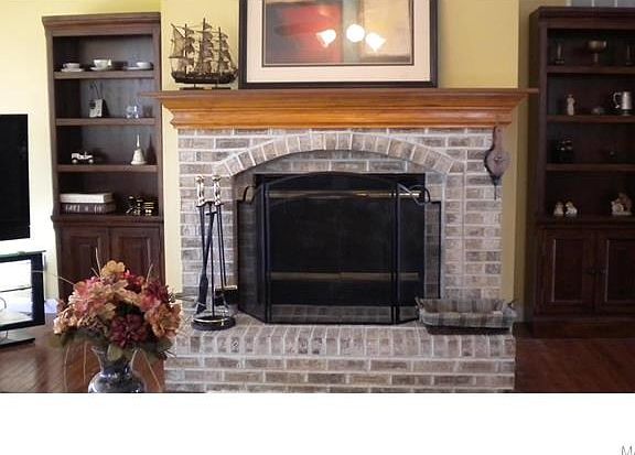 brick wood burning fireplace