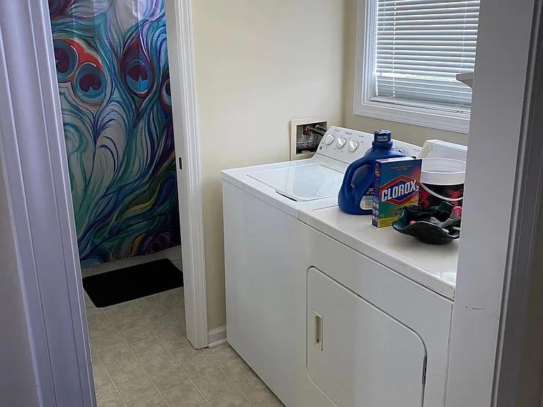 Laundry room is part of master suite.