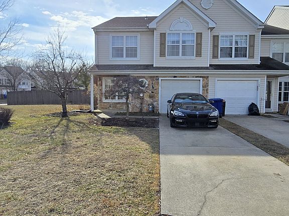 Front with garage and 2 car park