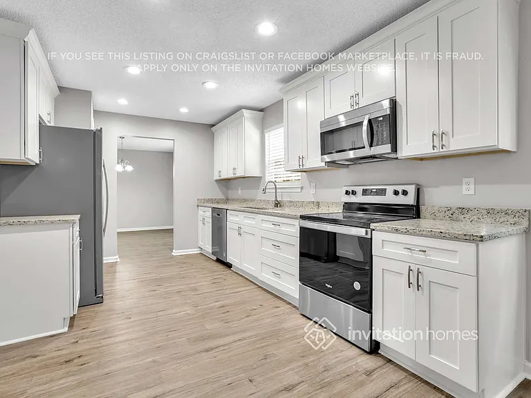 5614 Carriage Walk Way — Photo 7