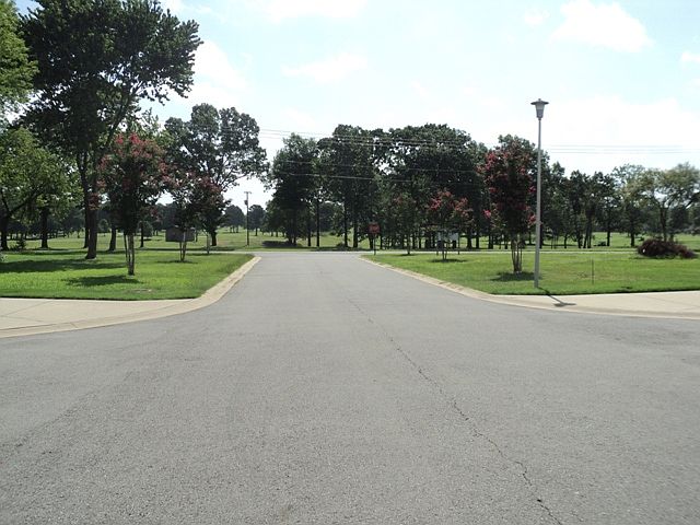 Directly across from the Conway Country Club.