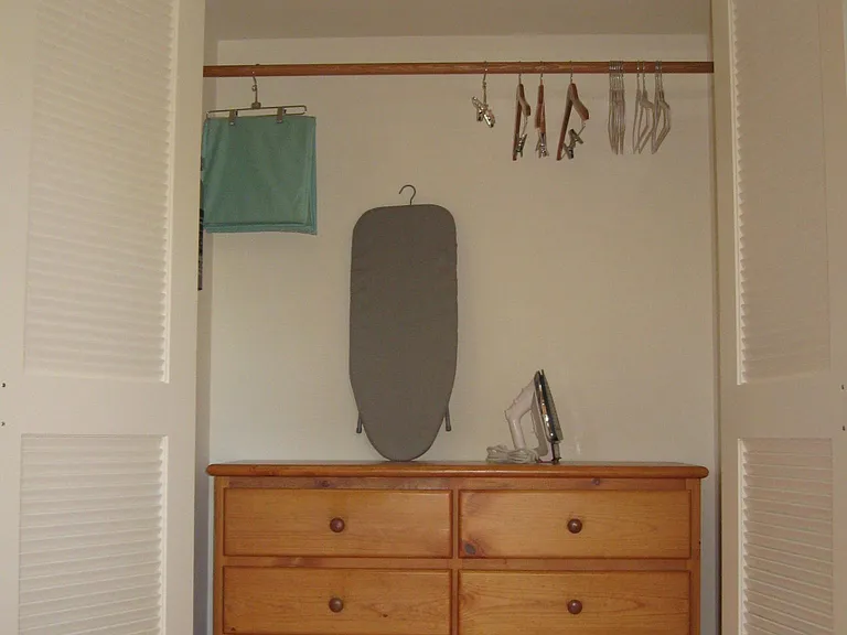 MiniSplit heating and air conditioning. Closet with double louvered doors, full dresser, hangers and ironing.