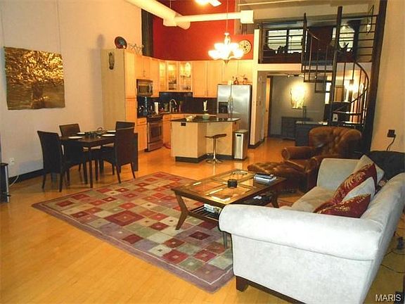 The great thing about a loft is you can arrange your furniture so many different ways to fit your lifestyle- plus the high ceilings are great.