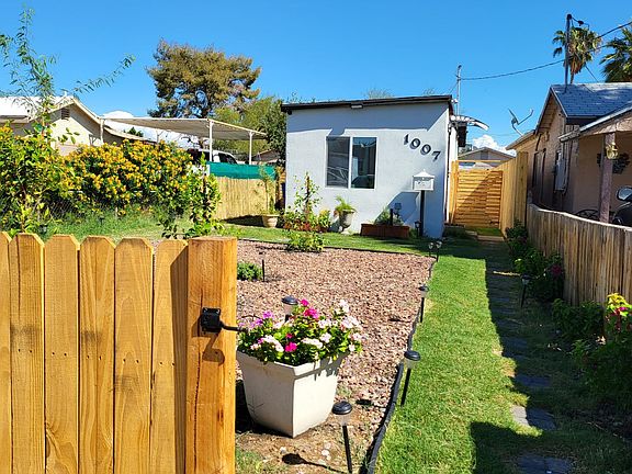 Entrance from front gate leading to front door.
