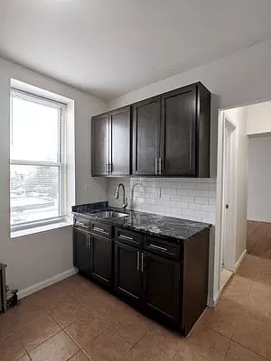 2nd image of 31-57 Steinway St #4