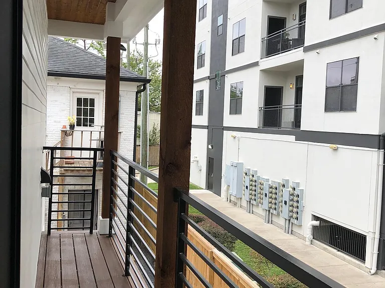 private balcony with ceiling fans and outdoor lighting