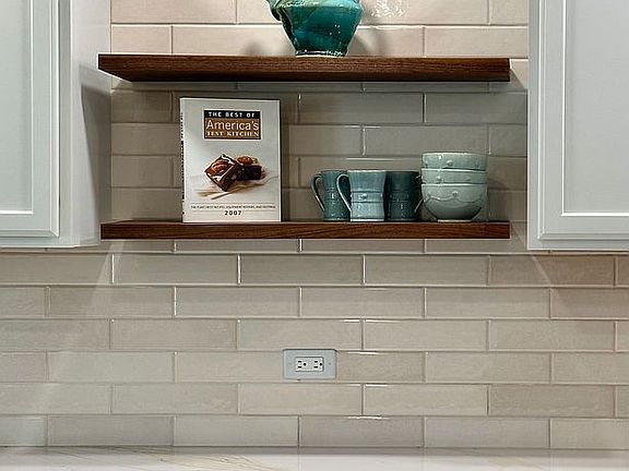 Custom made walnut shelves