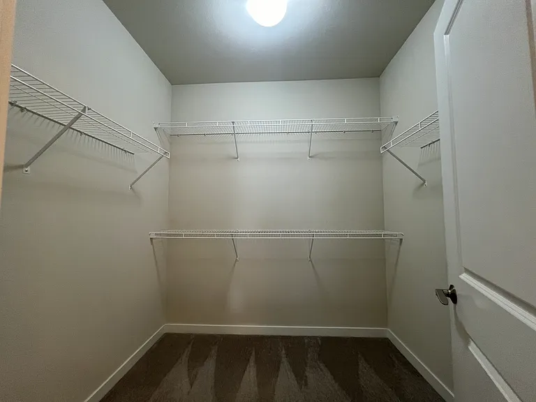 walk in closet for primary bedroom