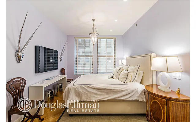 Sold by Douglas Elliman | media 12