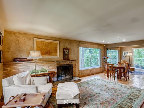 Looking from the foyer towards the dining area and the kitchen's dining area!  How will you set up your new home?