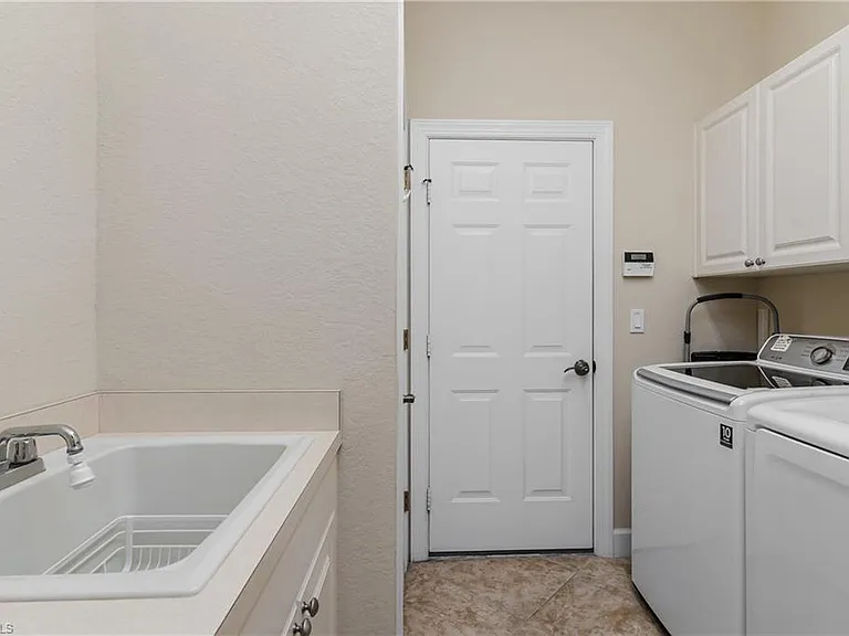 8754 Hideaway Harbor Ct — Photo 32