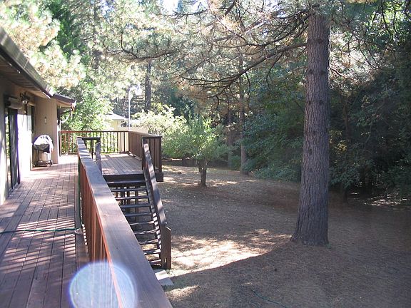 large deck and a large flat lot