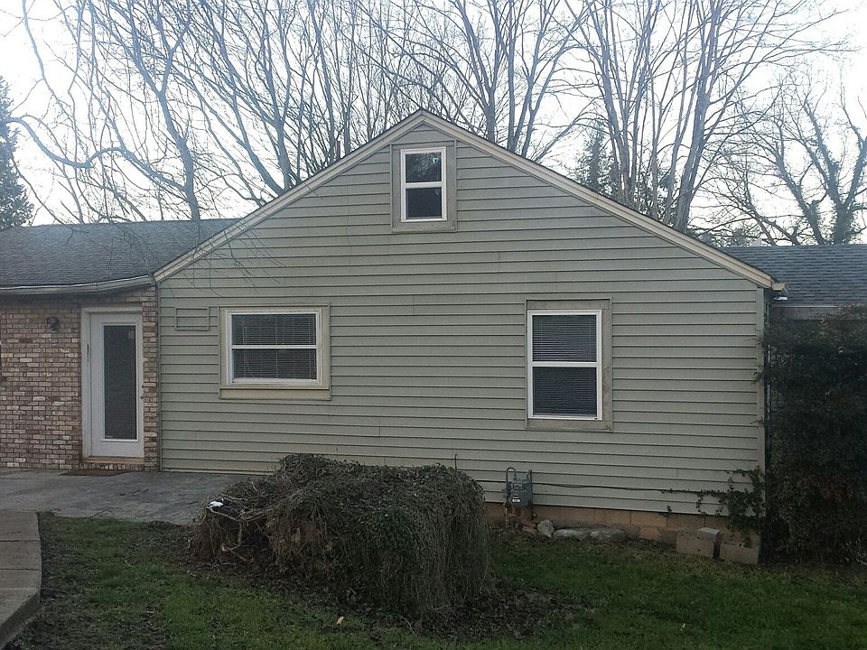 Exterior brick and vinyl with DECK and Patio