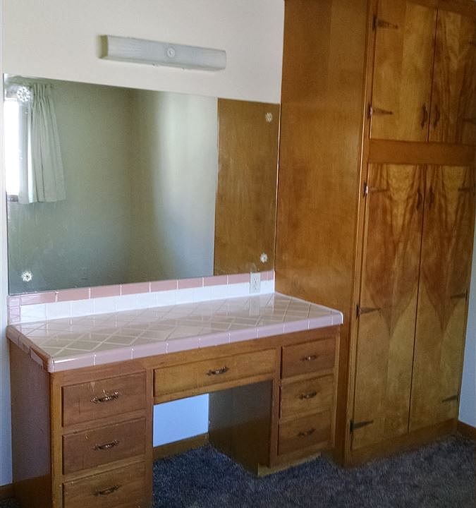 Built-in Vanity/Desk, and one of the Built-in Cedar Wardrobe