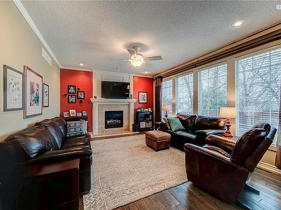 GREAT ROOM WITH FIREPLACE & LOTS OF WINDOWS!