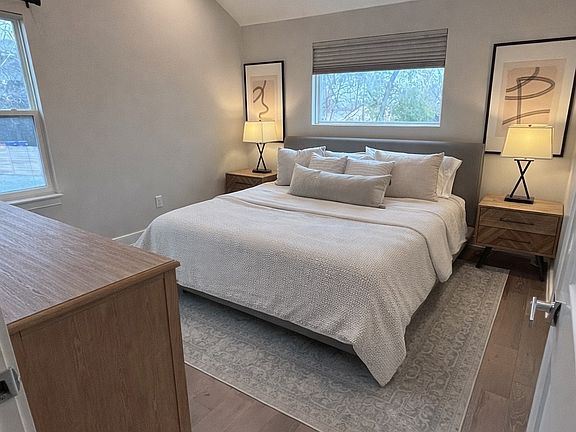 Primary bedroom with abundant natural light