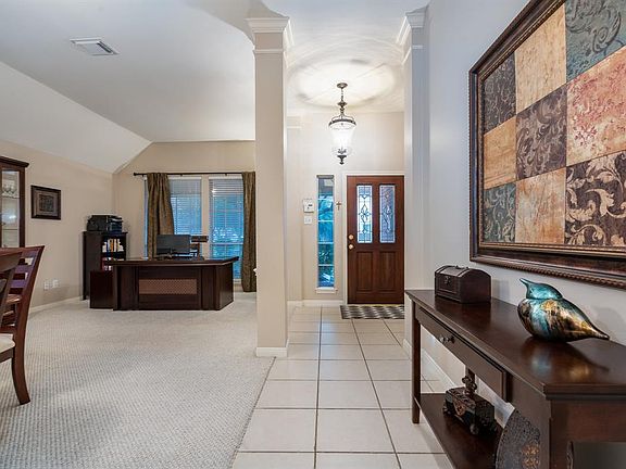 Ceramic tile flooring leads you to the main living areas of this wonderful home!