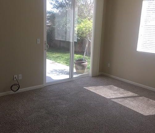 Master bedroom has exit to backyard. Carpet in all bedrooms.