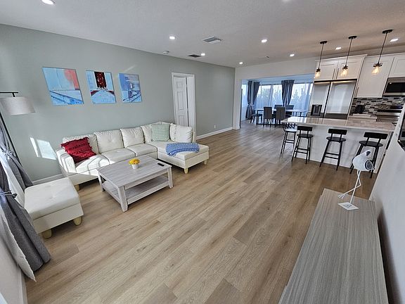 Entryway to home - Living room, kitchen and dining room