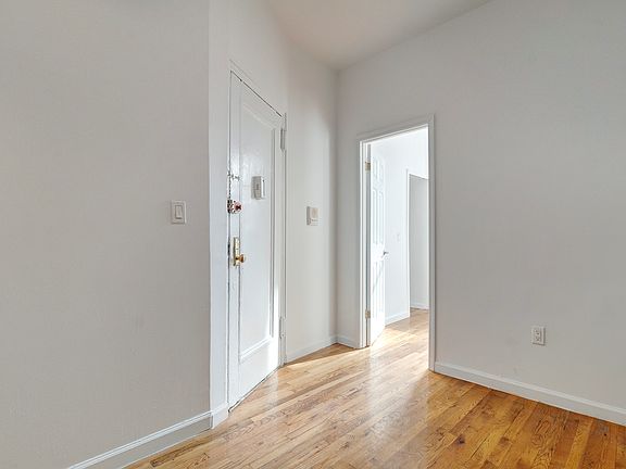 3rd image of 31 E 1st St APT 1C