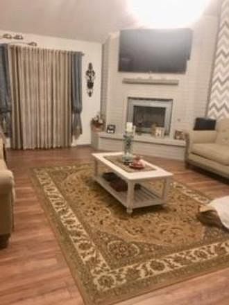 Living room with the View of Backyard