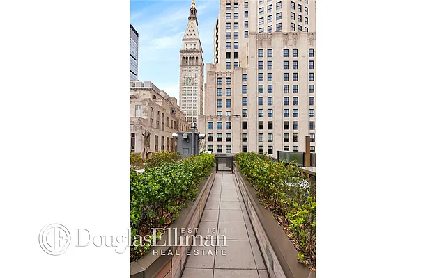 Sold by Douglas Elliman | media 11