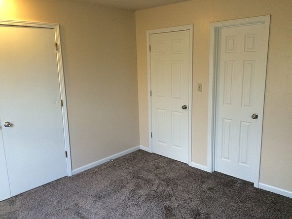 master bedroom with door to bath