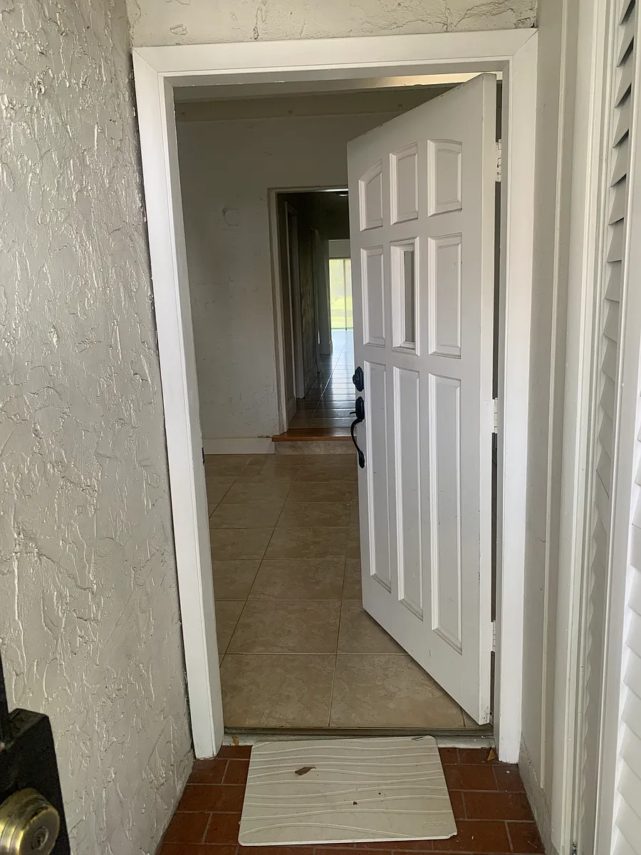 Gated entrance leads to front door - 9014 SW 62nd Ter