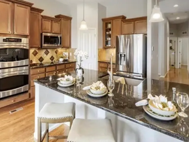 Open kitchen with hallway to the two bedrooms.
