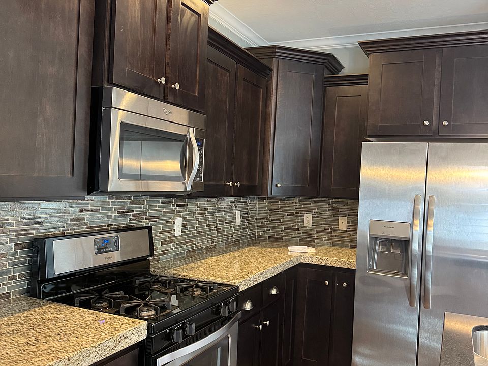 Gas stove top, dual fridge, plenty of cupboards.