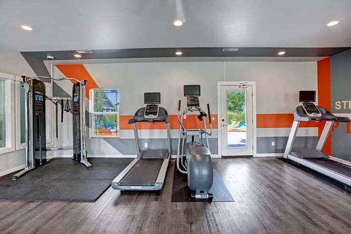 Fitness Center with Cardio and Strength Training Equipment