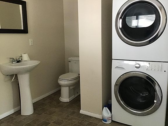 Downstairs half bath with laundry (one more smaller half bath downstairs)