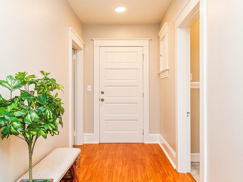 Generous front entry space connects bath and each bedroom