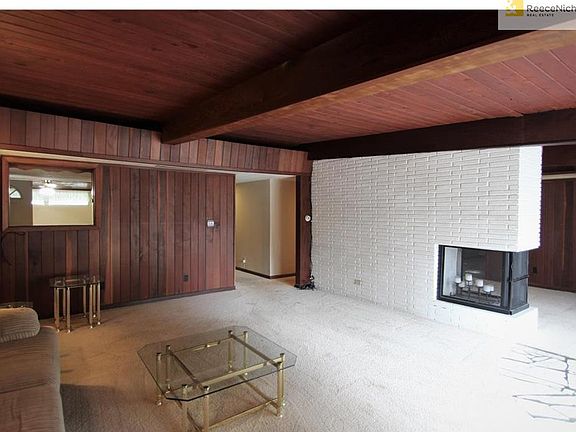 Open Living Room Adjacent To Kitchen