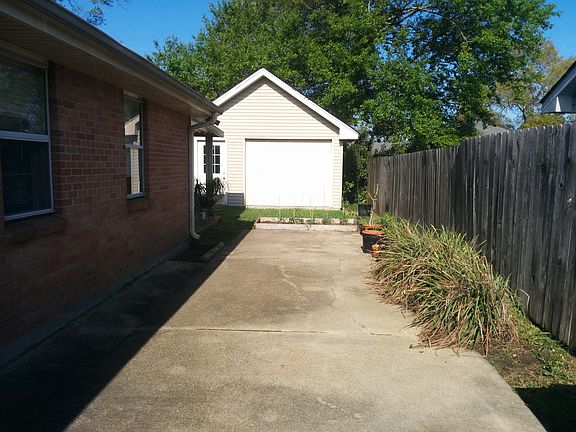 Driveway beside house