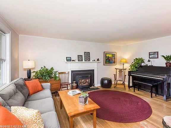 The family is very bright and open with a wood burning stove.