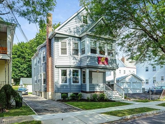 Front view w/ shared driveway