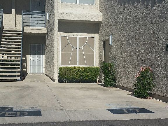 Entrance to unit, and assigned parking space